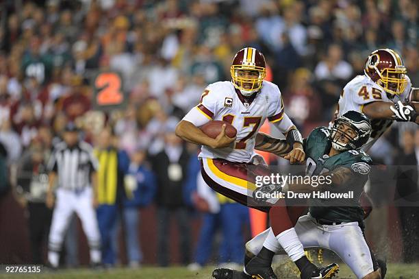 Quarterback Jason Campbell of the Washington Redskins gets sacked by defensive end Jason Babin of the Philadelphia Eagles on October 26, 2009 at...