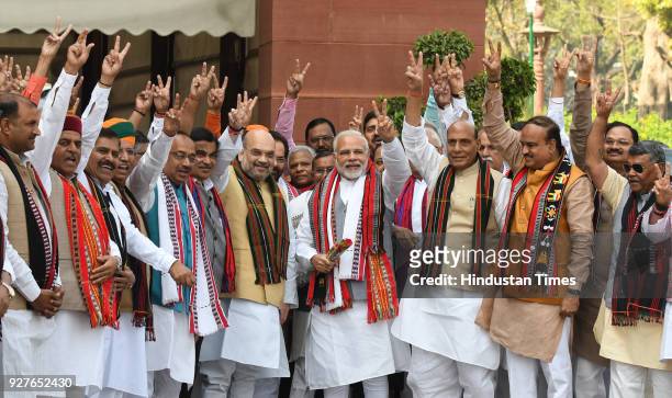 Prime Minister Narendra Modi with BJP leaders Amit Shah, Rajnath Singh, Vijay Goel, Ananth Kumar and other cabinet ministers pose for a photograph...