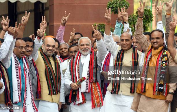 Prime Minister Narendra Modi with BJP leaders Amit Shah, Rajnath Singh, Vijay Goel, Ananth Kumar and other cabinet ministers pose for a photograph...