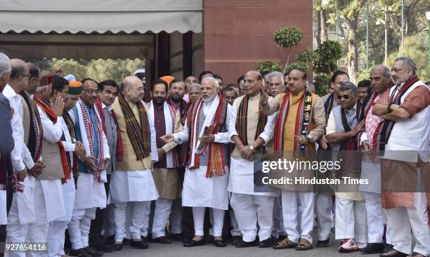 Prime Minister Narendra Modi with BJP leaders Amit Shah, Rajnath Singh, Vijay Goel, Ananth Kumar and other cabinet ministers pose for a photograph...