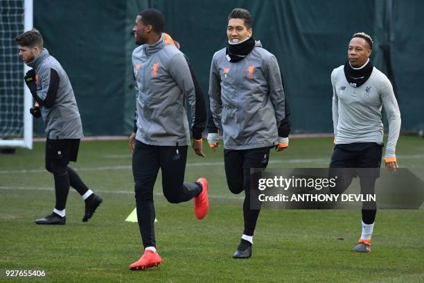 Liverpool's Spanish defender Alberto Moreno , Liverpool's Dutch midfielder Georginio Wijnaldum , Liverpool's Brazilian midfielder Roberto Firmino and...