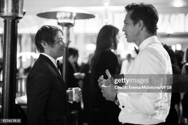 Sean Baker and Benjamin Bratt attend the 2018 Vanity Fair Oscar Party hosted by Radhika Jones at Wallis Annenberg Center for the Performing Arts on...