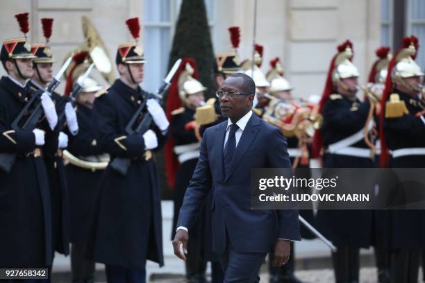 Benin's president Patrice Talon arrives to the Elysee Palace on March 5, 2018 in Paris. / AFP PHOTO / ludovic MARIN