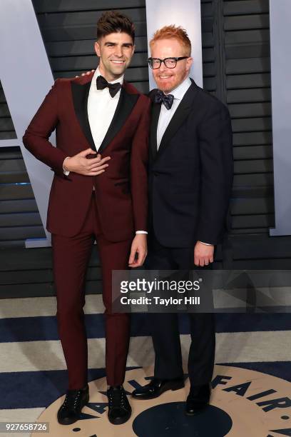 Justin Mikita and Jesse Tyler Ferguson attend the 2018 Vanity Fair Oscar Party hosted by Radhika Jones at Wallis Annenberg Center for the Performing...