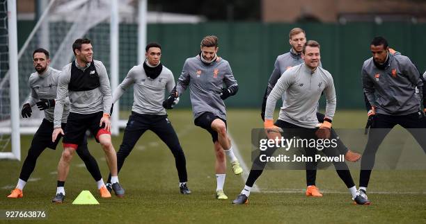 James Milner, Adam Lallana, Danny Ings, Trent Alexander-Arnold, Ragnar Klavan, Simon Mignolet and Joel Matip of Liverpool during a training session...