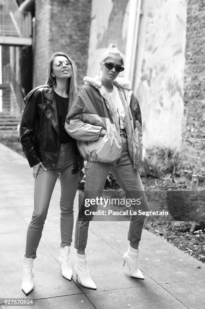 Elena Perminova and guest attend the Gianbastista Valli show as part of the Paris Fashion Week Womenswear Fall/Winter 2018/2019 on March 5, 2018 in...