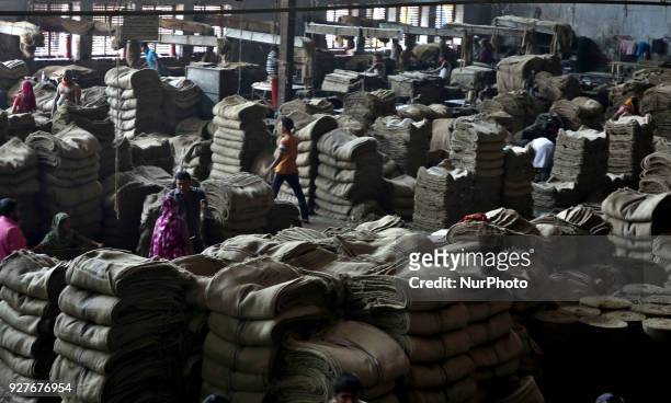 Workers busy in making jute sacks at Latif Bawany Jute Mills in Demra, Dhaka, on 5 March 2018 amid the country is ready to celebrate National Jute...