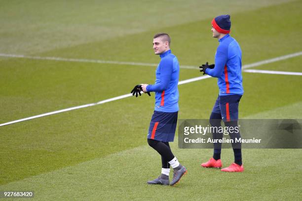 Marco Verratti reacts as he arrives for a Paris Saint-Germain training session ahead of the Champion's League match against Real Madrid at Centre...