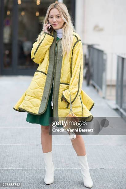 Tina Leung poses after the Giambattista Valli show at the Palais de Tokyo during Paris Fashion Week Womenswear FW 18/19 on March 5, 2018 in Paris,...