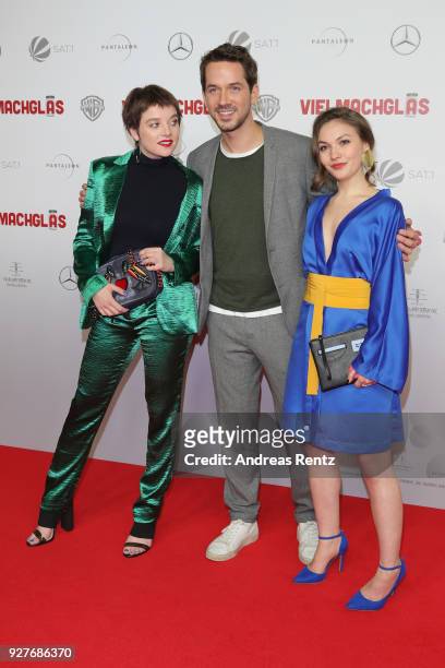 Jella Haase, Marc Benjamin and Emma Drogunova attend the premiere of 'Vielmachglas' at Cinedom on March 5, 2018 in Cologne, Germany.