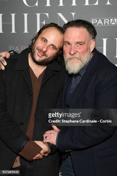 Vincent Macaigne and Bouli Lanners attend the "Chien" Paris Premiere at Mk2 Bibliotheque on March 5, 2018 in Paris, France.