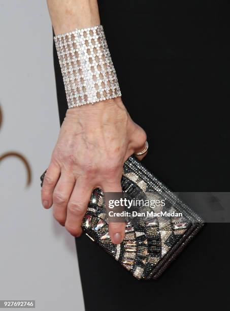 Actor Cate Capshaw, clutch bag detail, attends the 90th Annual Academy Awards at Hollywood & Highland Center on March 4, 2018 in Hollywood,...