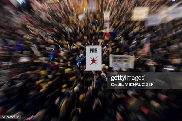 Demonstrators attend a protest against Czech Prime Minister Andrej Babis, Czech President Milos Zeman and newly-elected chairman of parliament's...