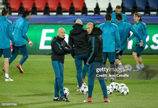 Coach of Real Madrid Zinedine Zidane and fitness coach Antonio Pintus during Real Madrid's training on the eve of UEFA Champions League match between...