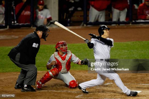 Hideki Matsui of the New York Yankees hits a 2-run home run in the bottom of the second inning against the Philadelphia Phillies in Game Six of the...