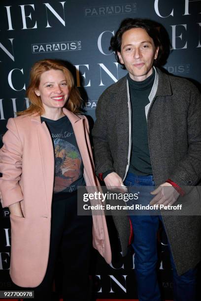 Actress Melanie Thierry and singer Raphael attend the "Chien" Paris Premiere at Mk2 Bibliotheque on March 5, 2018 in Paris, France.