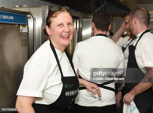Chef Angela Hartnett prepares food in the kitchen at Who's Cooking Dinner? 2018, a charity dinner featuring 20 of the capital's finest chefs cooking...
