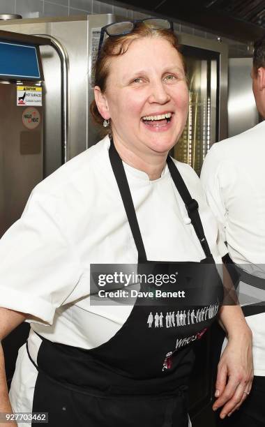 Chef Angela Hartnett prepares food in the kitchen at Who's Cooking Dinner? 2018, a charity dinner featuring 20 of the capital's finest chefs cooking...