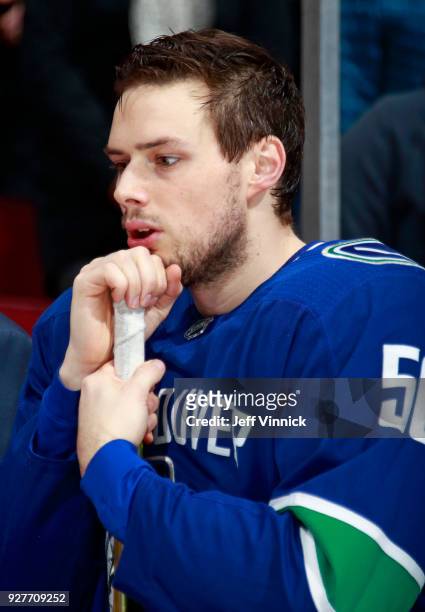 Brendan Gaunce of the Vancouver Canucks looks on from the bench during their NHL game against the Tampa Bay Lightning at Rogers Arena February 3,...