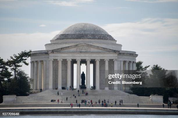 Visitors walk around the Jefferson Memorial in Washington, D.C., U.S., on Wednesday, Feb. 28, 2018. The U.S. Senate is expected to approve a sweeping...