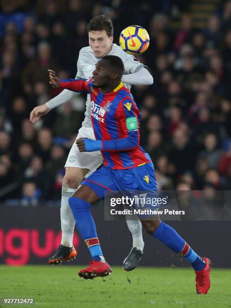 Victor Lindelof of Manchester United in action with Christian Benteke of Crystal Palace during the Premier League match between Crystal Palace and...
