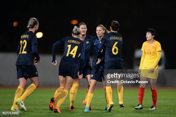 Players of Australia celebrate after scoring a goal during the Women's Algarve Cup Tournament match between Australia and China at Estadio Municipal...
