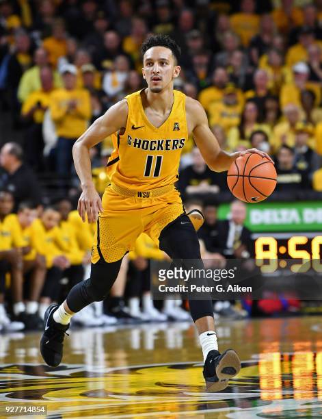 Landry Shamet of the Wichita State Shockers brings the ball up court during the first half against the Cincinnati Bearcats on March 4, 2018 at...
