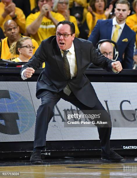 Head coach Gregg Marshall of the Wichita State Shockers watches from the sideline against the Cincinnati Bearcats during the second half on March 4,...