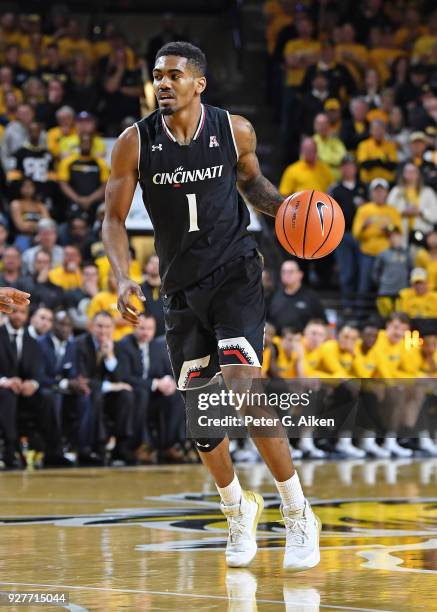 Jacob Evans of the Cincinnati Bearcats brings the ball up the court against the Wichita State Shockers during the second half on March 4, 2018 at...