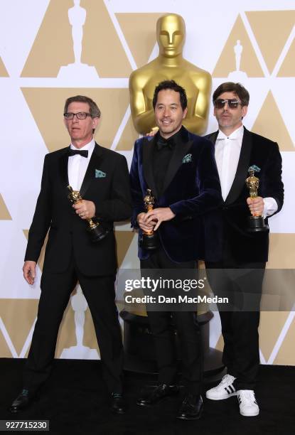 Set decorator Jeffrey A. Melvin, production designer Paul Denham Austerberry, and set decorator Shane Vieau, winners of the Best Production Design...