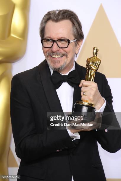 Actor Gary Oldman, winner of the Best Actor award for 'Darkest Hour,' poses in the press room at the 90th Annual Academy Awards at Hollywood &...