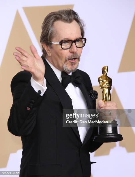 Actor Gary Oldman, winner of the Best Actor award for 'Darkest Hour,' poses in the press room at the 90th Annual Academy Awards at Hollywood &...