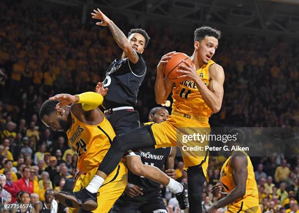 Landry Shamet of the Wichita State Shockers pulls down a rebound during the second half against the Cincinnati Bearcats on March 4, 2018 at Charles...