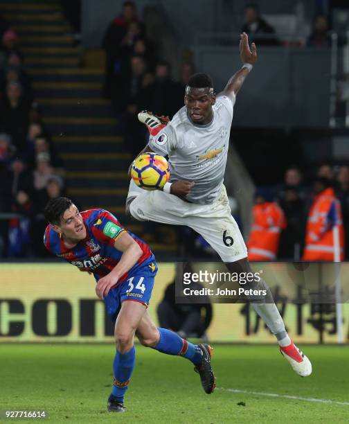 Paul Pogba of Manchester United in action with Martin Kelly of Crystal Palace during the Premier League match between Crystal Palace and Manchester...