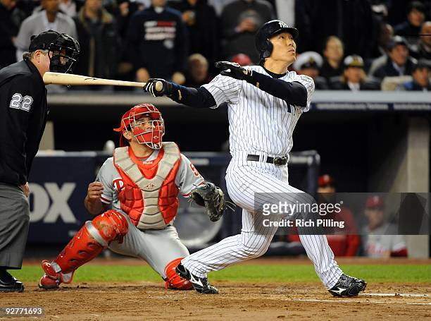 Hideki Matsui of the New York Yankees hits a two-run home run in the bottom of the second inning of Game Six of the 2009 MLB World Series at Yankee...