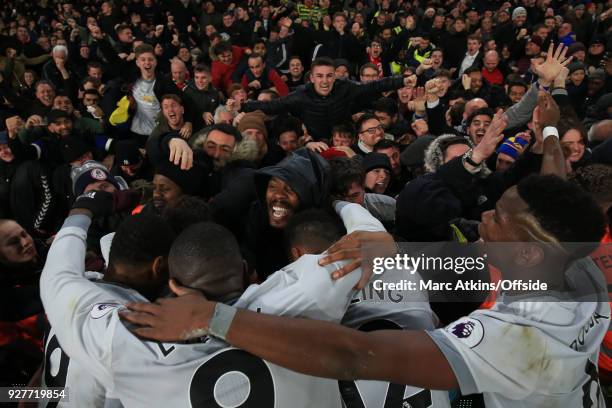 United players celebrate the late winner from Nemanja Matic with the fans during the Premier League match between Crystal Palace and Manchester...