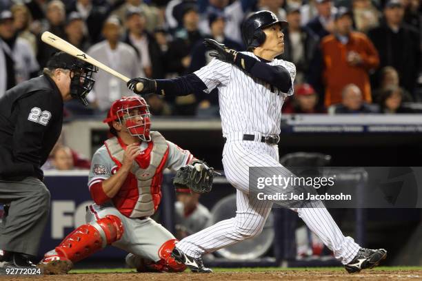 Hideki Matsui of the New York Yankees hits a 2-run double in the bottom of the fifth inning against the Philadelphia Phillies in Game Six of the 2009...