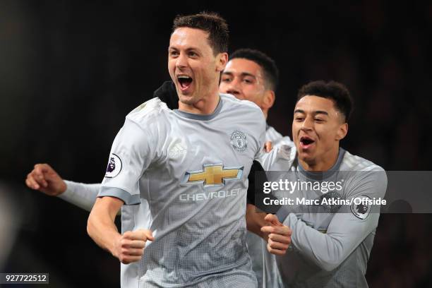 Nemanja Matic of Manchester United celebrates his late winning goal with Jesse Lingard during the Premier League match between Crystal Palace and...