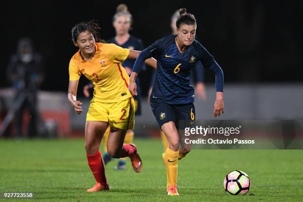 Chloe Logarzo of Australia competes for the ball with Liu Shanshan of China during the Women's Algarve Cup Tournament match between Australia and...
