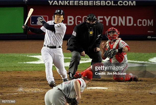 Hideki Matsui of the New York Yankees hits a 2-run double in the bottom of the fifth inning against the Philadelphia Phillies in Game Six of the 2009...
