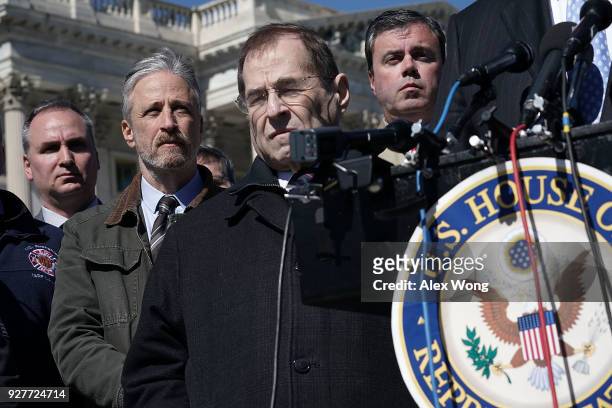 Comedian Jon Stewart and U.S. Rep. Jerrold Nadler listen during a news conference March 5, 2018 on Capitol Hill in Washington, DC. Stewart took part...