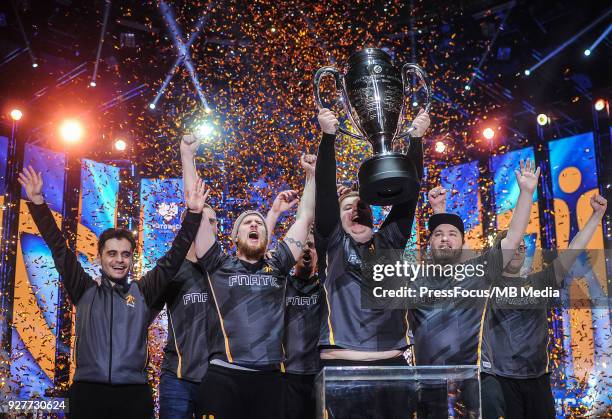 Team Fnatic lift winners' cup after Counter-Strike: Global Offensive final game between FaZe Clan and Fnatic on March 4, 2018 in Katowice, Poland.