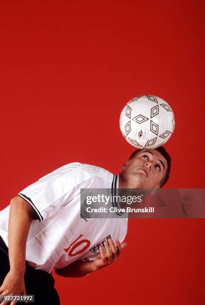 Michael Owen of England and Liverpool Football Club poses for a portrait for sports clothing & accessories company Umbro at the Worxx Studio on 18...