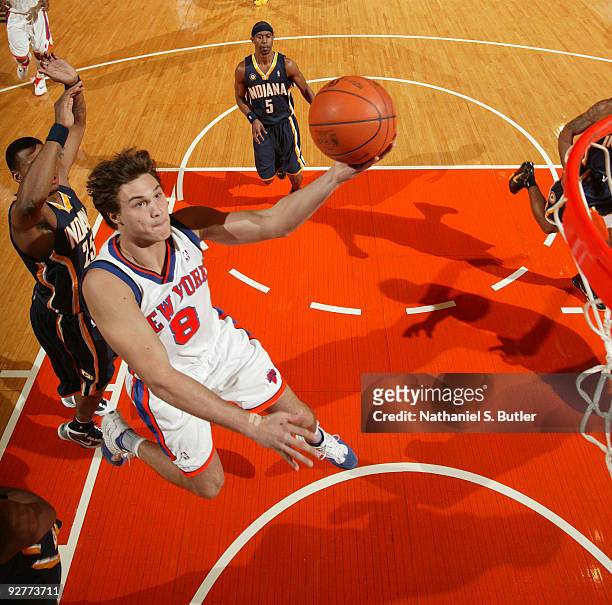 Danilo Gallinari of the New York Knicks shoots against Brandon Rush of the Indiana Pacers on November 4, 2009 at Madison Square Garden in New York...
