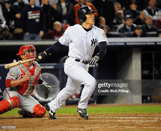 Hideki Matsui of the New York Yankees hits a two-RBI double in the bottom of the fifth inning of Game Six of the 2009 MLB World Series at Yankee...