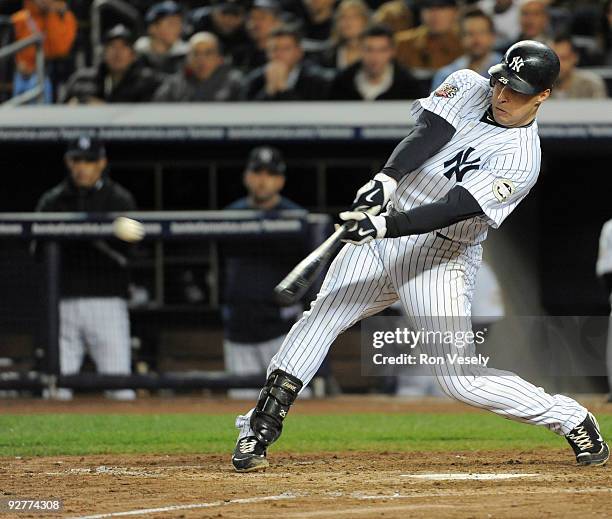 Mark Teixeira of the New York Yankees hits a RBI single in the bottom of the fifth inning of Game Six of the 2009 MLB World Series against the...