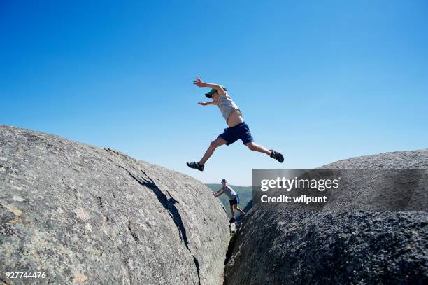 Diving In Between Two Rocks Jumping Two Rocks Photos and Premium High Res Pictures - Getty Images