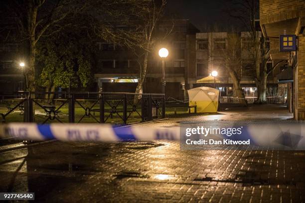 Forensic tent stands over a bench where a man and woman had been found unconscious the previous day, on March 5, 2018 in Salisbury, England. The man...