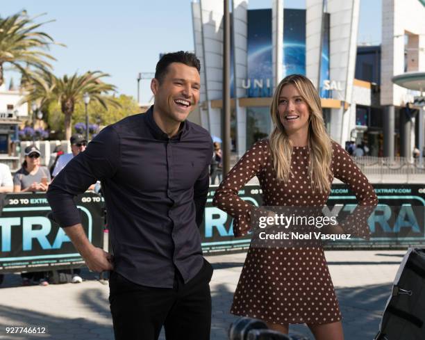 Mark Wright and Renee Bargh visit "Extra" at Universal Studios Hollywood on March 5, 2018 in Universal City, California.