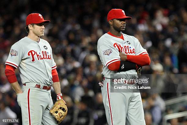 Chase Utley and Ryan Howard of the Philadelphia Phillies look on late in the game against the New York Yankees in Game Six of the 2009 MLB World...